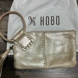 Hobo Sable Wristlet Clutch Pearl Gold Cream color with tassel zipper